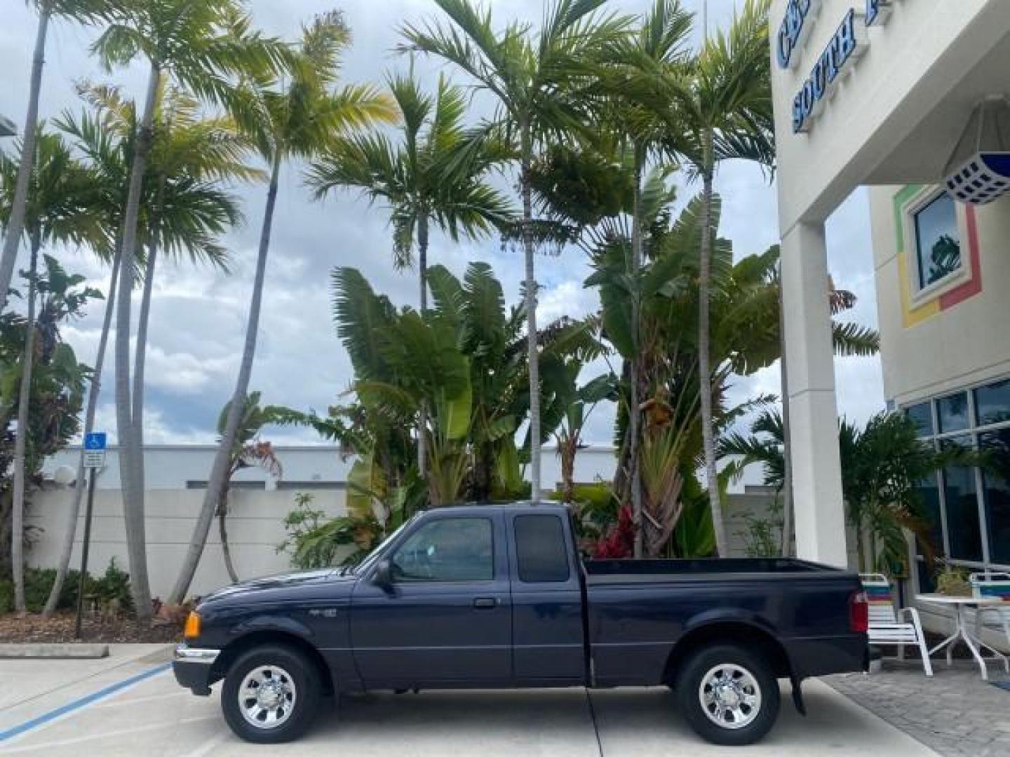 2003 Deep Wedgewood Blue Metallic /Dark Graphite Ford Ranger XLT AUTO X CAB LOW MILES 76,750 (1FTYR44V53P) with an 3.0L SEFI Flex-Fuel FFV V6 Engine engine, Automatic transmission, located at 4701 North Dixie Hwy, Pompano Beach, FL, 33064, (954) 422-2889, 26.240938, -80.123474 - OUR WEBPAGE FLORIDACARS1.COM HAS OVER 100 PHOTOS AND FREE CARFAX LINK 2003 Ford Ranger XLT AUTO AC LOADED GOOD FOR POOL SERVICE OR DELIEVERY SERVICE VERY DEPENDABLE 4 Door Extended Cab Pickup 3.0L V6 F Flex Fuel 23 MPG Rear Wheel Drive Features ABS Brakes Air Conditioning AM/FM Stereo Automatic Tran- Photo#4
