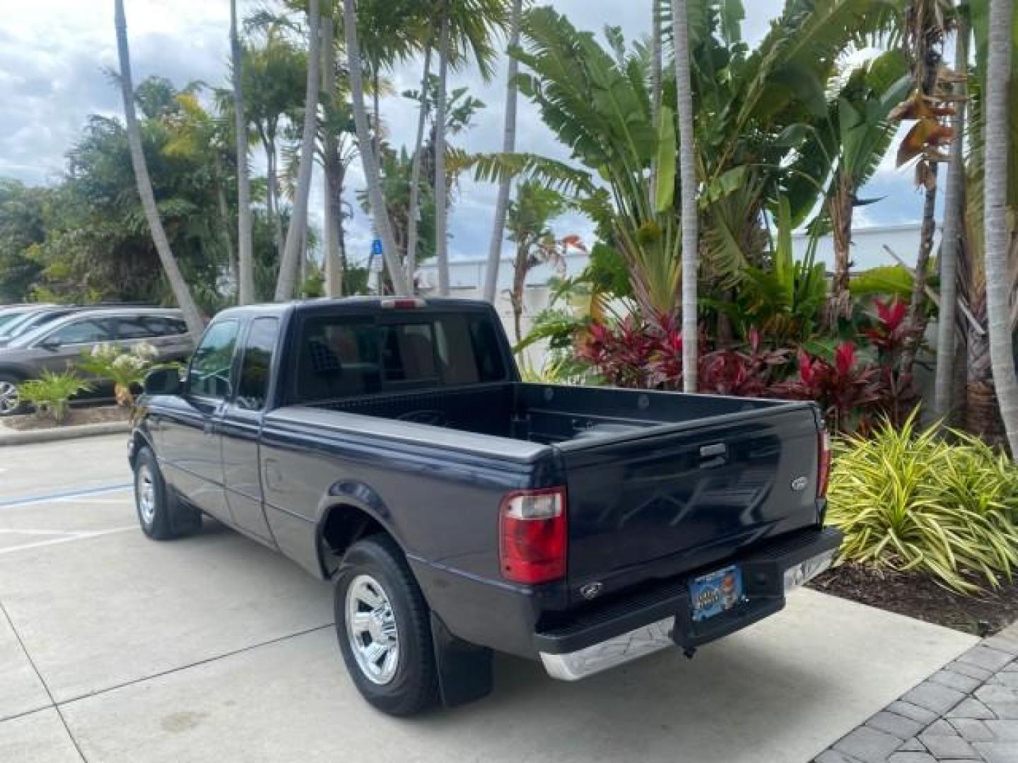 2003 Deep Wedgewood Blue Metallic /Dark Graphite Ford Ranger XLT AUTO X CAB LOW MILES 76,750 (1FTYR44V53P) with an 3.0L SEFI Flex-Fuel FFV V6 Engine engine, Automatic transmission, located at 4701 North Dixie Hwy, Pompano Beach, FL, 33064, (954) 422-2889, 26.240938, -80.123474 - OUR WEBPAGE FLORIDACARS1.COM HAS OVER 100 PHOTOS AND FREE CARFAX LINK 2003 Ford Ranger XLT AUTO AC LOADED GOOD FOR POOL SERVICE OR DELIEVERY SERVICE VERY DEPENDABLE 4 Door Extended Cab Pickup 3.0L V6 F Flex Fuel 23 MPG Rear Wheel Drive Features ABS Brakes Air Conditioning AM/FM Stereo Automatic Tran- Photo#5