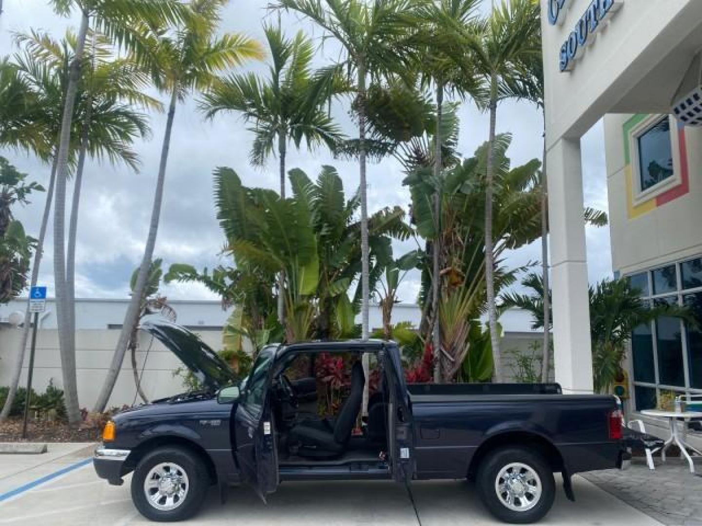 2003 Deep Wedgewood Blue Metallic /Dark Graphite Ford Ranger XLT AUTO X CAB LOW MILES 76,750 (1FTYR44V53P) with an 3.0L SEFI Flex-Fuel FFV V6 Engine engine, Automatic transmission, located at 4701 North Dixie Hwy, Pompano Beach, FL, 33064, (954) 422-2889, 26.240938, -80.123474 - OUR WEBPAGE FLORIDACARS1.COM HAS OVER 100 PHOTOS AND FREE CARFAX LINK 2003 Ford Ranger XLT AUTO AC LOADED GOOD FOR POOL SERVICE OR DELIEVERY SERVICE VERY DEPENDABLE 4 Door Extended Cab Pickup 3.0L V6 F Flex Fuel 23 MPG Rear Wheel Drive Features ABS Brakes Air Conditioning AM/FM Stereo Automatic Tran- Photo#8