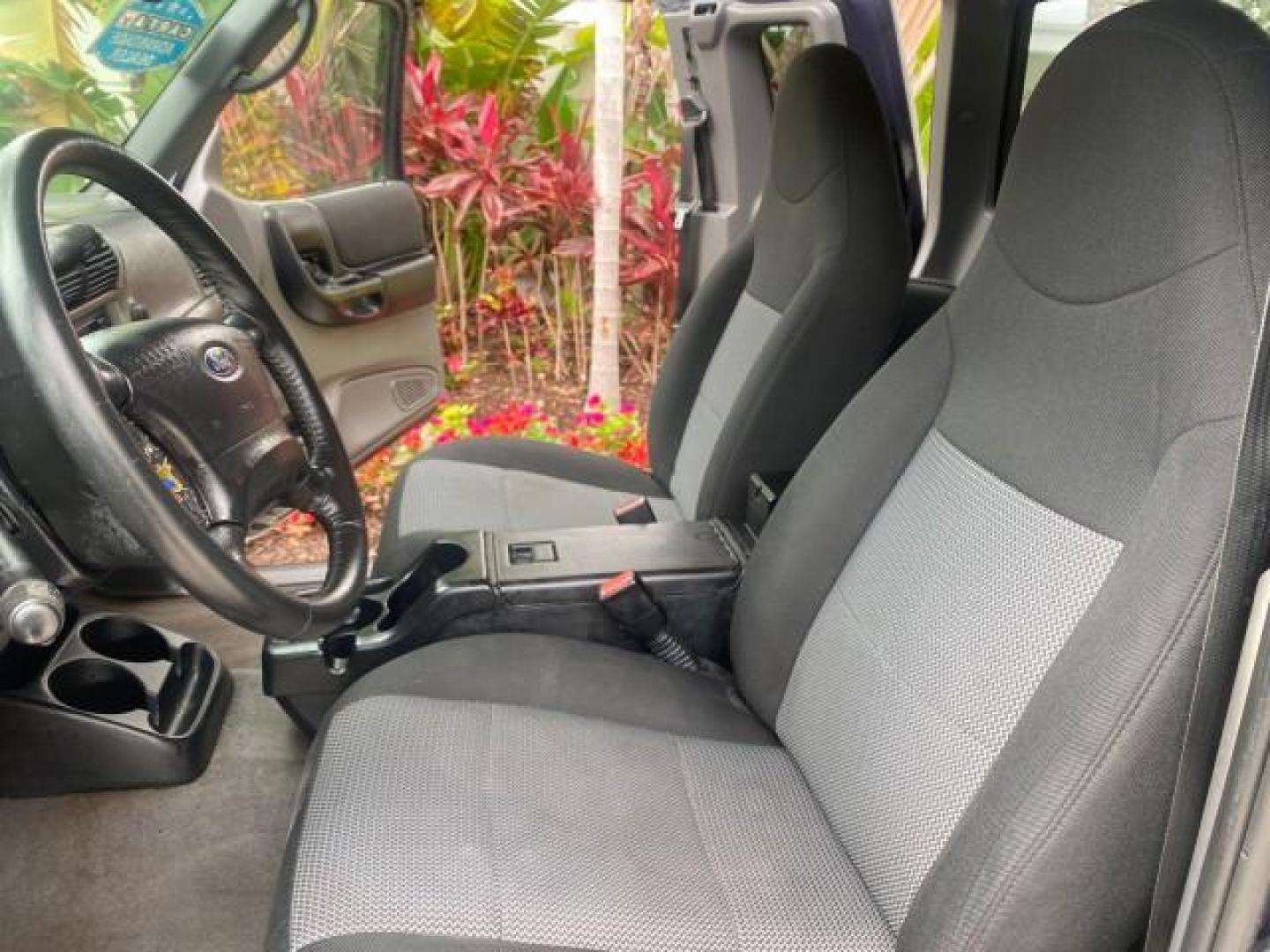 2003 Deep Wedgewood Blue Metallic /Dark Graphite Ford Ranger XLT AUTO X CAB LOW MILES 76,750 (1FTYR44V53P) with an 3.0L SEFI Flex-Fuel FFV V6 Engine engine, Automatic transmission, located at 4701 North Dixie Hwy, Pompano Beach, FL, 33064, (954) 422-2889, 26.240938, -80.123474 - OUR WEBPAGE FLORIDACARS1.COM HAS OVER 100 PHOTOS AND FREE CARFAX LINK 2003 Ford Ranger XLT AUTO AC LOADED GOOD FOR POOL SERVICE OR DELIEVERY SERVICE VERY DEPENDABLE 4 Door Extended Cab Pickup 3.0L V6 F Flex Fuel 23 MPG Rear Wheel Drive Features ABS Brakes Air Conditioning AM/FM Stereo Automatic Tran- Photo#10