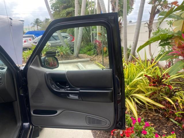 2003 Deep Wedgewood Blue Metallic /Dark Graphite Ford Ranger XLT AUTO X CAB LOW MILES 76,750 (1FTYR44V53P) with an 3.0L SEFI Flex-Fuel FFV V6 Engine engine, Automatic transmission, located at 4701 North Dixie Hwy, Pompano Beach, FL, 33064, (954) 422-2889, 26.240938, -80.123474 - OUR WEBPAGE FLORIDACARS1.COM HAS OVER 100 PHOTOS AND FREE CARFAX LINK 2003 Ford Ranger XLT AUTO AC LOADED GOOD FOR POOL SERVICE OR DELIEVERY SERVICE VERY DEPENDABLE 4 Door Extended Cab Pickup 3.0L V6 F Flex Fuel 23 MPG Rear Wheel Drive Features ABS Brakes Air Conditioning AM/FM Stereo Automatic Tran - Photo#11