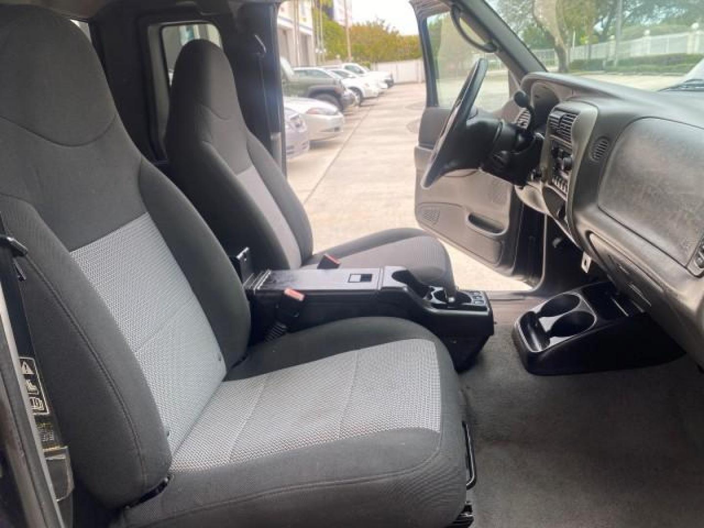 2003 Deep Wedgewood Blue Metallic /Dark Graphite Ford Ranger XLT AUTO X CAB LOW MILES 76,750 (1FTYR44V53P) with an 3.0L SEFI Flex-Fuel FFV V6 Engine engine, Automatic transmission, located at 4701 North Dixie Hwy, Pompano Beach, FL, 33064, (954) 422-2889, 26.240938, -80.123474 - OUR WEBPAGE FLORIDACARS1.COM HAS OVER 100 PHOTOS AND FREE CARFAX LINK 2003 Ford Ranger XLT AUTO AC LOADED GOOD FOR POOL SERVICE OR DELIEVERY SERVICE VERY DEPENDABLE 4 Door Extended Cab Pickup 3.0L V6 F Flex Fuel 23 MPG Rear Wheel Drive Features ABS Brakes Air Conditioning AM/FM Stereo Automatic Tran- Photo#12