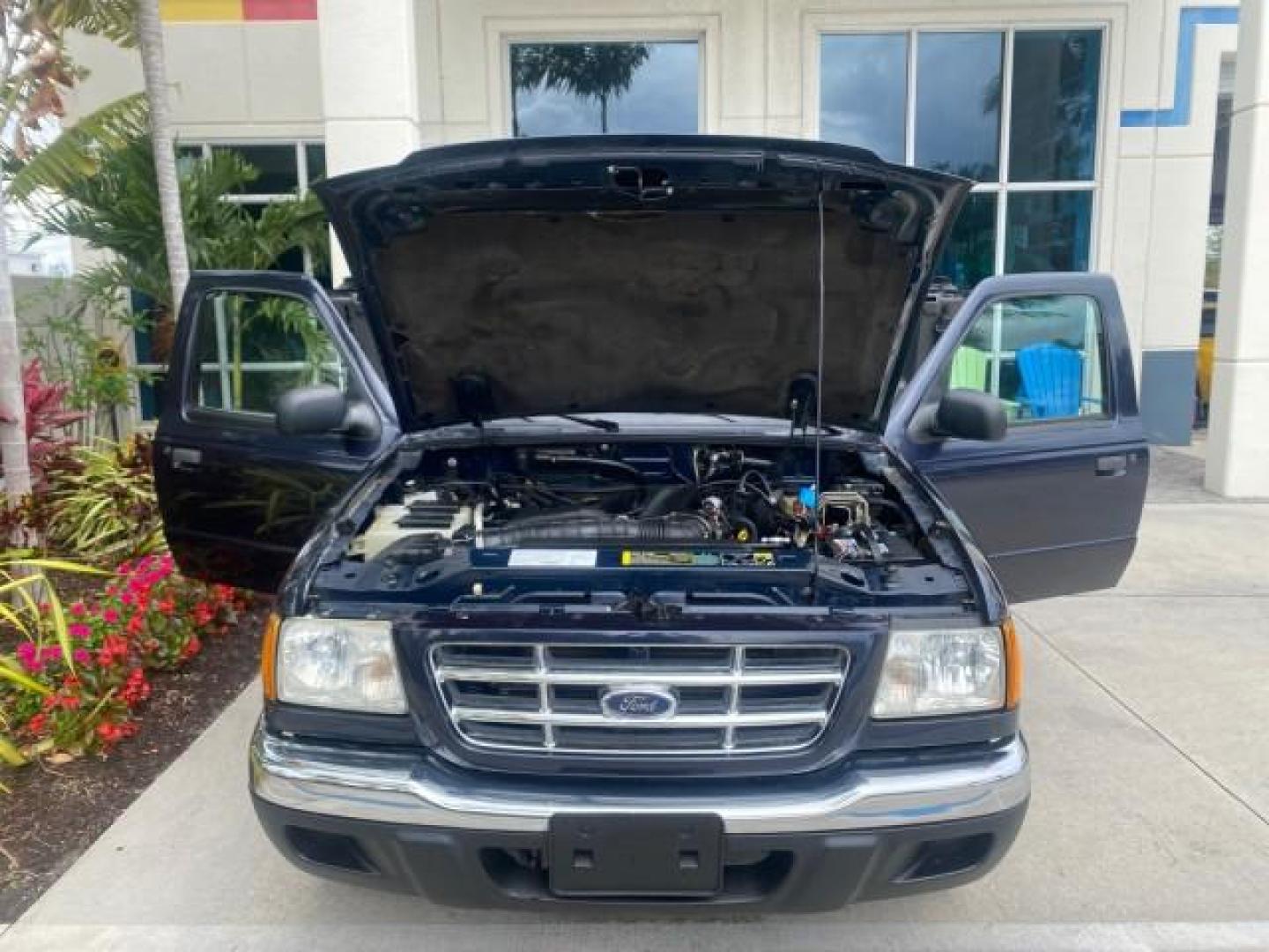 2003 Deep Wedgewood Blue Metallic /Dark Graphite Ford Ranger XLT AUTO X CAB LOW MILES 76,750 (1FTYR44V53P) with an 3.0L SEFI Flex-Fuel FFV V6 Engine engine, Automatic transmission, located at 4701 North Dixie Hwy, Pompano Beach, FL, 33064, (954) 422-2889, 26.240938, -80.123474 - OUR WEBPAGE FLORIDACARS1.COM HAS OVER 100 PHOTOS AND FREE CARFAX LINK 2003 Ford Ranger XLT AUTO AC LOADED GOOD FOR POOL SERVICE OR DELIEVERY SERVICE VERY DEPENDABLE 4 Door Extended Cab Pickup 3.0L V6 F Flex Fuel 23 MPG Rear Wheel Drive Features ABS Brakes Air Conditioning AM/FM Stereo Automatic Tran- Photo#17