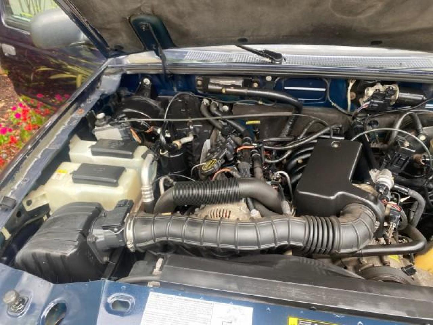 2003 Deep Wedgewood Blue Metallic /Dark Graphite Ford Ranger XLT AUTO X CAB LOW MILES 76,750 (1FTYR44V53P) with an 3.0L SEFI Flex-Fuel FFV V6 Engine engine, Automatic transmission, located at 4701 North Dixie Hwy, Pompano Beach, FL, 33064, (954) 422-2889, 26.240938, -80.123474 - OUR WEBPAGE FLORIDACARS1.COM HAS OVER 100 PHOTOS AND FREE CARFAX LINK 2003 Ford Ranger XLT AUTO AC LOADED GOOD FOR POOL SERVICE OR DELIEVERY SERVICE VERY DEPENDABLE 4 Door Extended Cab Pickup 3.0L V6 F Flex Fuel 23 MPG Rear Wheel Drive Features ABS Brakes Air Conditioning AM/FM Stereo Automatic Tran- Photo#24