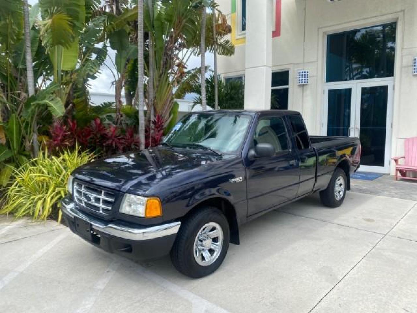 2003 Deep Wedgewood Blue Metallic /Dark Graphite Ford Ranger XLT AUTO X CAB LOW MILES 76,750 (1FTYR44V53P) with an 3.0L SEFI Flex-Fuel FFV V6 Engine engine, Automatic transmission, located at 4701 North Dixie Hwy, Pompano Beach, FL, 33064, (954) 422-2889, 26.240938, -80.123474 - OUR WEBPAGE FLORIDACARS1.COM HAS OVER 100 PHOTOS AND FREE CARFAX LINK 2003 Ford Ranger XLT AUTO AC LOADED GOOD FOR POOL SERVICE OR DELIEVERY SERVICE VERY DEPENDABLE 4 Door Extended Cab Pickup 3.0L V6 F Flex Fuel 23 MPG Rear Wheel Drive Features ABS Brakes Air Conditioning AM/FM Stereo Automatic Tran- Photo#28