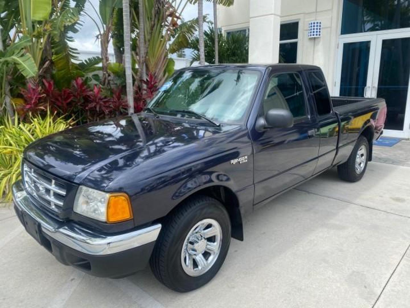 2003 Deep Wedgewood Blue Metallic /Dark Graphite Ford Ranger XLT AUTO X CAB LOW MILES 76,750 (1FTYR44V53P) with an 3.0L SEFI Flex-Fuel FFV V6 Engine engine, Automatic transmission, located at 4701 North Dixie Hwy, Pompano Beach, FL, 33064, (954) 422-2889, 26.240938, -80.123474 - OUR WEBPAGE FLORIDACARS1.COM HAS OVER 100 PHOTOS AND FREE CARFAX LINK 2003 Ford Ranger XLT AUTO AC LOADED GOOD FOR POOL SERVICE OR DELIEVERY SERVICE VERY DEPENDABLE 4 Door Extended Cab Pickup 3.0L V6 F Flex Fuel 23 MPG Rear Wheel Drive Features ABS Brakes Air Conditioning AM/FM Stereo Automatic Tran- Photo#29