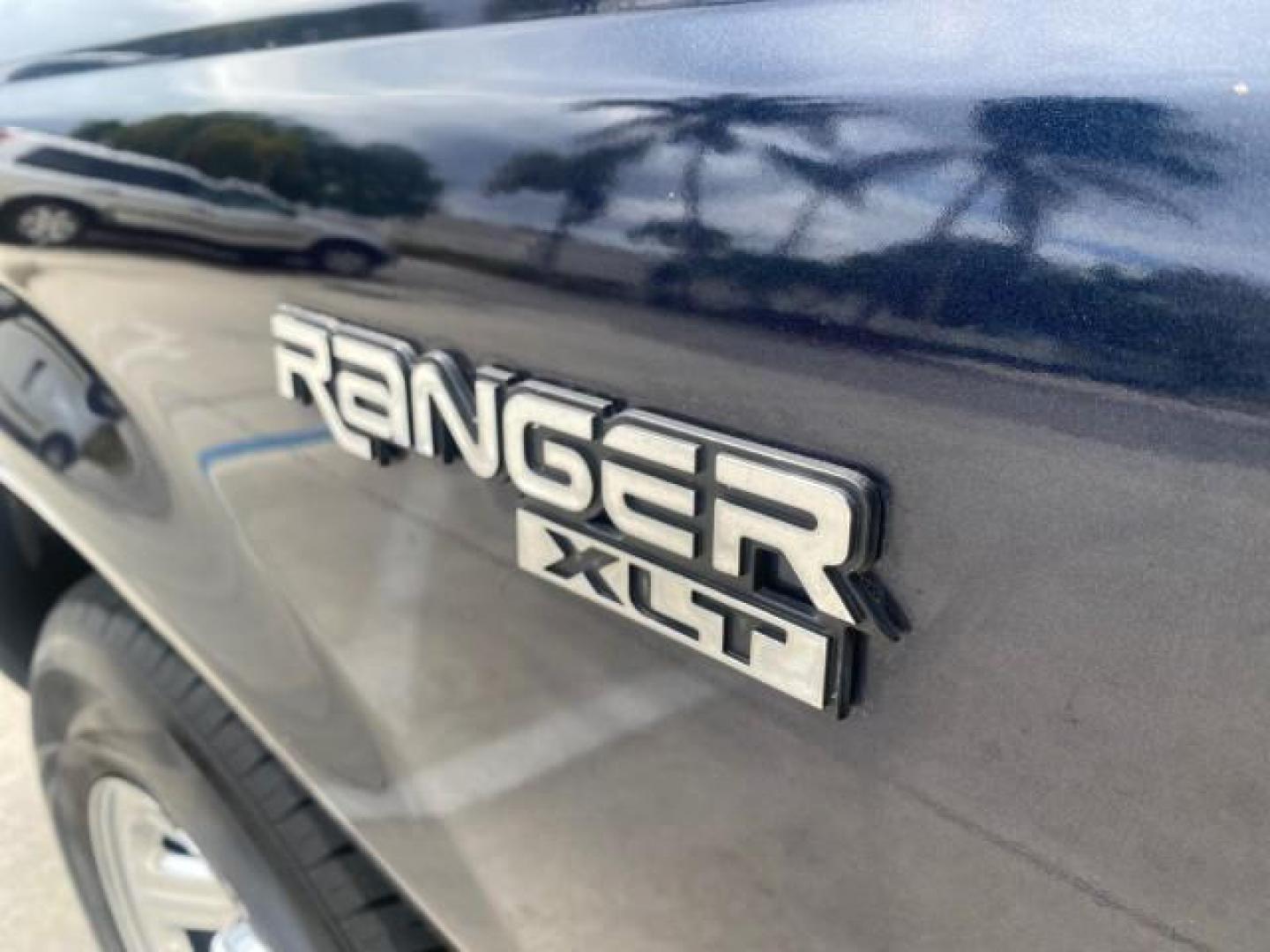 2003 Deep Wedgewood Blue Metallic /Dark Graphite Ford Ranger XLT AUTO X CAB LOW MILES 76,750 (1FTYR44V53P) with an 3.0L SEFI Flex-Fuel FFV V6 Engine engine, Automatic transmission, located at 4701 North Dixie Hwy, Pompano Beach, FL, 33064, (954) 422-2889, 26.240938, -80.123474 - OUR WEBPAGE FLORIDACARS1.COM HAS OVER 100 PHOTOS AND FREE CARFAX LINK 2003 Ford Ranger XLT AUTO AC LOADED GOOD FOR POOL SERVICE OR DELIEVERY SERVICE VERY DEPENDABLE 4 Door Extended Cab Pickup 3.0L V6 F Flex Fuel 23 MPG Rear Wheel Drive Features ABS Brakes Air Conditioning AM/FM Stereo Automatic Tran- Photo#41