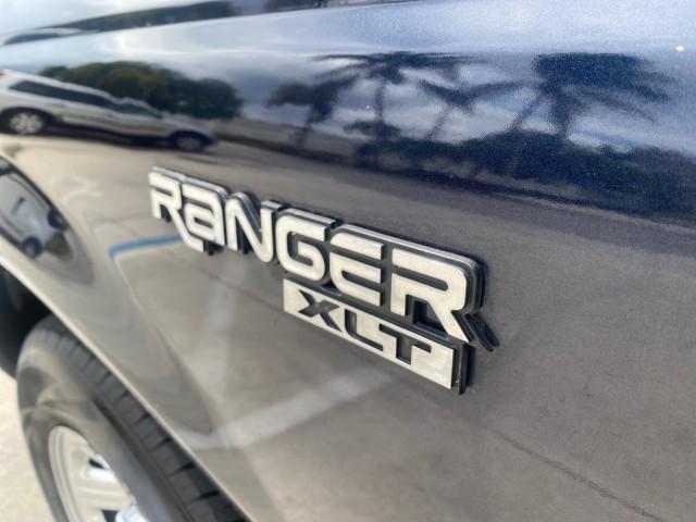 2003 Deep Wedgewood Blue Metallic /Dark Graphite Ford Ranger XLT AUTO X CAB LOW MILES 76,750 (1FTYR44V53P) with an 3.0L SEFI Flex-Fuel FFV V6 Engine engine, Automatic transmission, located at 4701 North Dixie Hwy, Pompano Beach, FL, 33064, (954) 422-2889, 26.240938, -80.123474 - OUR WEBPAGE FLORIDACARS1.COM HAS OVER 100 PHOTOS AND FREE CARFAX LINK 2003 Ford Ranger XLT AUTO AC LOADED GOOD FOR POOL SERVICE OR DELIEVERY SERVICE VERY DEPENDABLE 4 Door Extended Cab Pickup 3.0L V6 F Flex Fuel 23 MPG Rear Wheel Drive Features ABS Brakes Air Conditioning AM/FM Stereo Automatic Tran - Photo#41