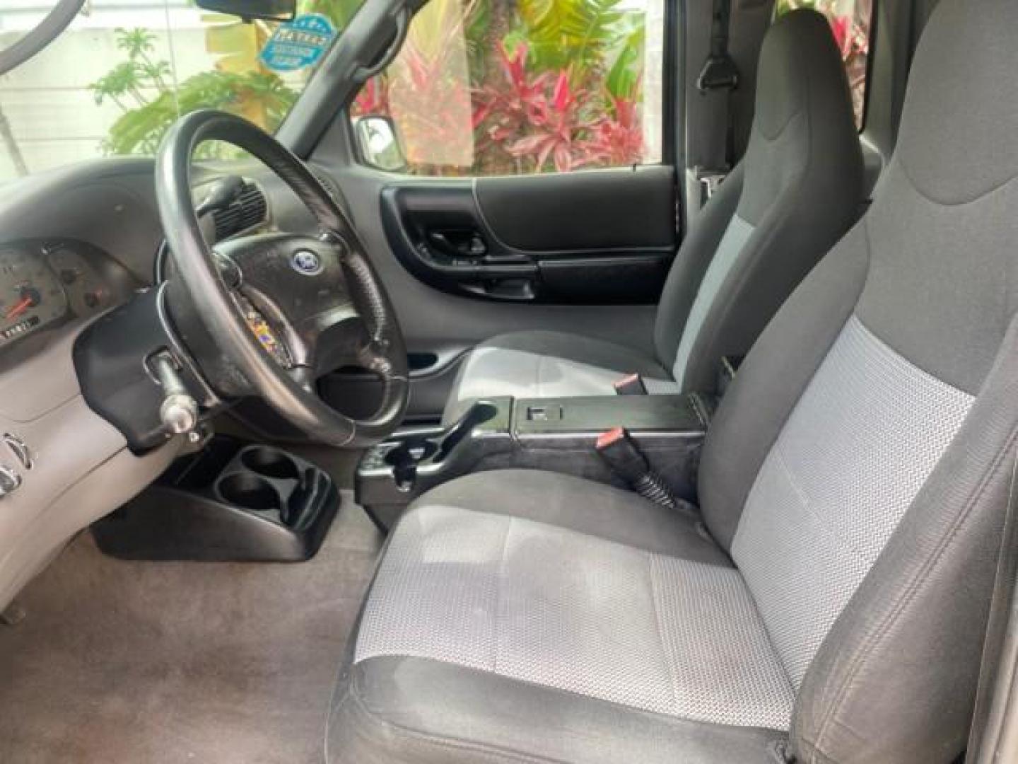 2003 Deep Wedgewood Blue Metallic /Dark Graphite Ford Ranger XLT AUTO X CAB LOW MILES 76,750 (1FTYR44V53P) with an 3.0L SEFI Flex-Fuel FFV V6 Engine engine, Automatic transmission, located at 4701 North Dixie Hwy, Pompano Beach, FL, 33064, (954) 422-2889, 26.240938, -80.123474 - OUR WEBPAGE FLORIDACARS1.COM HAS OVER 100 PHOTOS AND FREE CARFAX LINK 2003 Ford Ranger XLT AUTO AC LOADED GOOD FOR POOL SERVICE OR DELIEVERY SERVICE VERY DEPENDABLE 4 Door Extended Cab Pickup 3.0L V6 F Flex Fuel 23 MPG Rear Wheel Drive Features ABS Brakes Air Conditioning AM/FM Stereo Automatic Tran- Photo#45