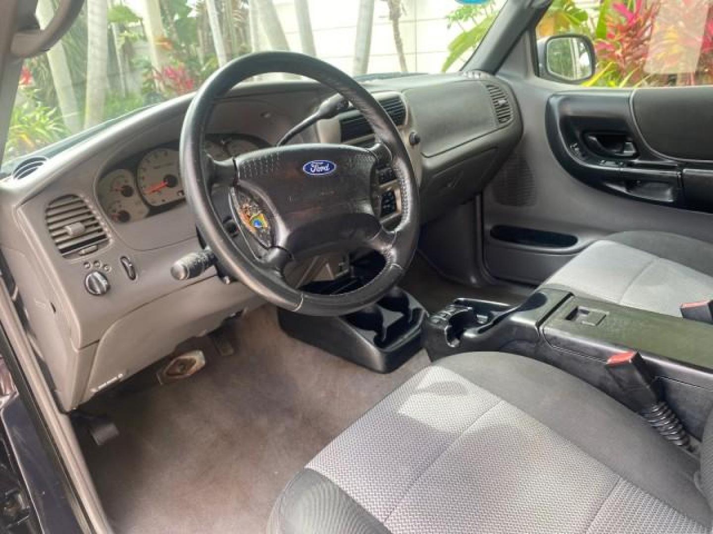 2003 Deep Wedgewood Blue Metallic /Dark Graphite Ford Ranger XLT AUTO X CAB LOW MILES 76,750 (1FTYR44V53P) with an 3.0L SEFI Flex-Fuel FFV V6 Engine engine, Automatic transmission, located at 4701 North Dixie Hwy, Pompano Beach, FL, 33064, (954) 422-2889, 26.240938, -80.123474 - OUR WEBPAGE FLORIDACARS1.COM HAS OVER 100 PHOTOS AND FREE CARFAX LINK 2003 Ford Ranger XLT AUTO AC LOADED GOOD FOR POOL SERVICE OR DELIEVERY SERVICE VERY DEPENDABLE 4 Door Extended Cab Pickup 3.0L V6 F Flex Fuel 23 MPG Rear Wheel Drive Features ABS Brakes Air Conditioning AM/FM Stereo Automatic Tran- Photo#48