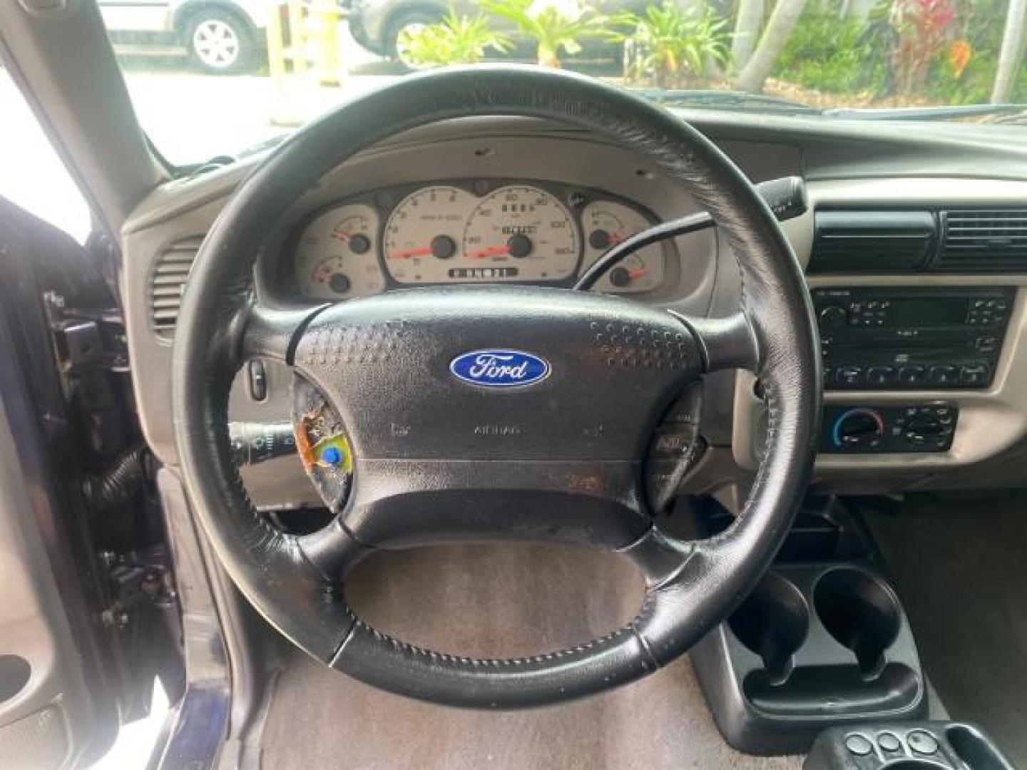 2003 Deep Wedgewood Blue Metallic /Dark Graphite Ford Ranger XLT AUTO X CAB LOW MILES 76,750 (1FTYR44V53P) with an 3.0L SEFI Flex-Fuel FFV V6 Engine engine, Automatic transmission, located at 4701 North Dixie Hwy, Pompano Beach, FL, 33064, (954) 422-2889, 26.240938, -80.123474 - OUR WEBPAGE FLORIDACARS1.COM HAS OVER 100 PHOTOS AND FREE CARFAX LINK 2003 Ford Ranger XLT AUTO AC LOADED GOOD FOR POOL SERVICE OR DELIEVERY SERVICE VERY DEPENDABLE 4 Door Extended Cab Pickup 3.0L V6 F Flex Fuel 23 MPG Rear Wheel Drive Features ABS Brakes Air Conditioning AM/FM Stereo Automatic Tran- Photo#49