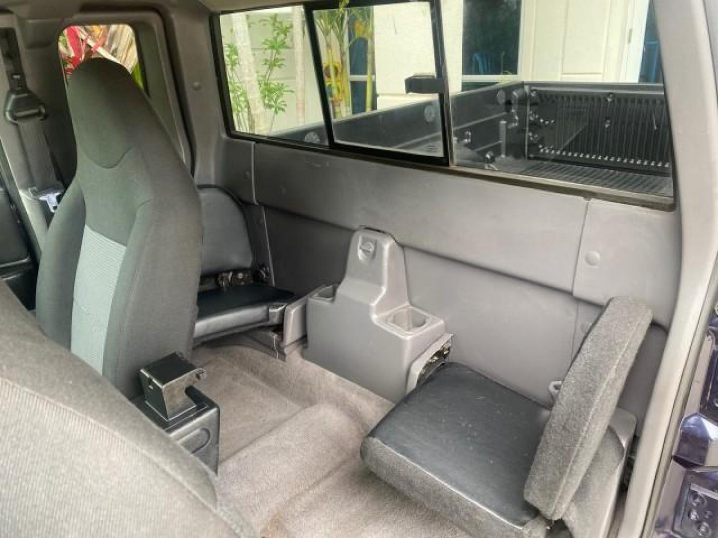2003 Deep Wedgewood Blue Metallic /Dark Graphite Ford Ranger XLT AUTO X CAB LOW MILES 76,750 (1FTYR44V53P) with an 3.0L SEFI Flex-Fuel FFV V6 Engine engine, Automatic transmission, located at 4701 North Dixie Hwy, Pompano Beach, FL, 33064, (954) 422-2889, 26.240938, -80.123474 - OUR WEBPAGE FLORIDACARS1.COM HAS OVER 100 PHOTOS AND FREE CARFAX LINK 2003 Ford Ranger XLT AUTO AC LOADED GOOD FOR POOL SERVICE OR DELIEVERY SERVICE VERY DEPENDABLE 4 Door Extended Cab Pickup 3.0L V6 F Flex Fuel 23 MPG Rear Wheel Drive Features ABS Brakes Air Conditioning AM/FM Stereo Automatic Tran- Photo#74