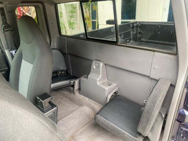 2003 Deep Wedgewood Blue Metallic /Dark Graphite Ford Ranger XLT AUTO X CAB LOW MILES 76,750 (1FTYR44V53P) with an 3.0L SEFI Flex-Fuel FFV V6 Engine engine, Automatic transmission, located at 4701 North Dixie Hwy, Pompano Beach, FL, 33064, (954) 422-2889, 26.240938, -80.123474 - OUR WEBPAGE FLORIDACARS1.COM HAS OVER 100 PHOTOS AND FREE CARFAX LINK 2003 Ford Ranger XLT AUTO AC LOADED GOOD FOR POOL SERVICE OR DELIEVERY SERVICE VERY DEPENDABLE 4 Door Extended Cab Pickup 3.0L V6 F Flex Fuel 23 MPG Rear Wheel Drive Features ABS Brakes Air Conditioning AM/FM Stereo Automatic Tran - Photo#74