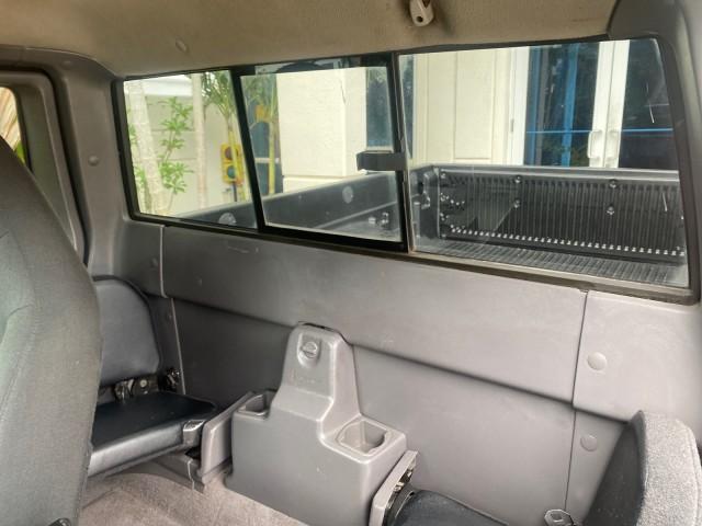 2003 Deep Wedgewood Blue Metallic /Dark Graphite Ford Ranger XLT AUTO X CAB LOW MILES 76,750 (1FTYR44V53P) with an 3.0L SEFI Flex-Fuel FFV V6 Engine engine, Automatic transmission, located at 4701 North Dixie Hwy, Pompano Beach, FL, 33064, (954) 422-2889, 26.240938, -80.123474 - OUR WEBPAGE FLORIDACARS1.COM HAS OVER 100 PHOTOS AND FREE CARFAX LINK 2003 Ford Ranger XLT AUTO AC LOADED GOOD FOR POOL SERVICE OR DELIEVERY SERVICE VERY DEPENDABLE 4 Door Extended Cab Pickup 3.0L V6 F Flex Fuel 23 MPG Rear Wheel Drive Features ABS Brakes Air Conditioning AM/FM Stereo Automatic Tran - Photo#75