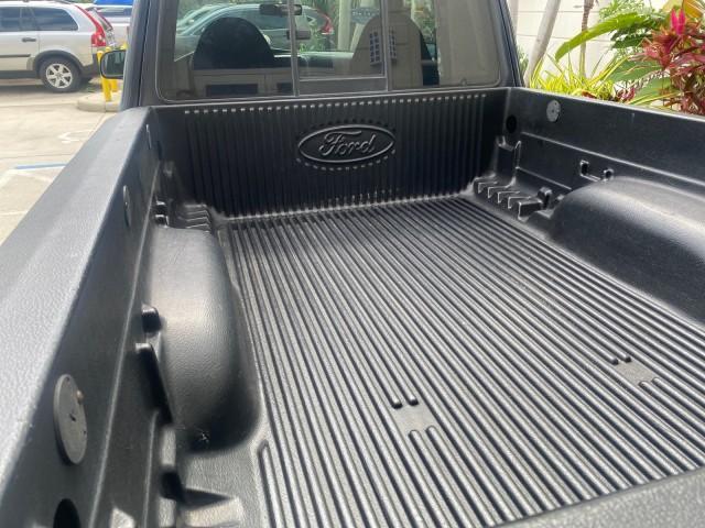 2003 Deep Wedgewood Blue Metallic /Dark Graphite Ford Ranger XLT AUTO X CAB LOW MILES 76,750 (1FTYR44V53P) with an 3.0L SEFI Flex-Fuel FFV V6 Engine engine, Automatic transmission, located at 4701 North Dixie Hwy, Pompano Beach, FL, 33064, (954) 422-2889, 26.240938, -80.123474 - OUR WEBPAGE FLORIDACARS1.COM HAS OVER 100 PHOTOS AND FREE CARFAX LINK 2003 Ford Ranger XLT AUTO AC LOADED GOOD FOR POOL SERVICE OR DELIEVERY SERVICE VERY DEPENDABLE 4 Door Extended Cab Pickup 3.0L V6 F Flex Fuel 23 MPG Rear Wheel Drive Features ABS Brakes Air Conditioning AM/FM Stereo Automatic Tran - Photo#87