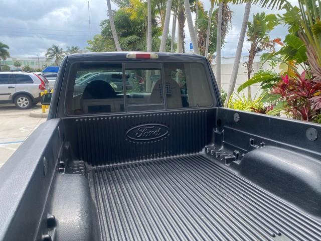 2003 Deep Wedgewood Blue Metallic /Dark Graphite Ford Ranger XLT AUTO X CAB LOW MILES 76,750 (1FTYR44V53P) with an 3.0L SEFI Flex-Fuel FFV V6 Engine engine, Automatic transmission, located at 4701 North Dixie Hwy, Pompano Beach, FL, 33064, (954) 422-2889, 26.240938, -80.123474 - OUR WEBPAGE FLORIDACARS1.COM HAS OVER 100 PHOTOS AND FREE CARFAX LINK 2003 Ford Ranger XLT AUTO AC LOADED GOOD FOR POOL SERVICE OR DELIEVERY SERVICE VERY DEPENDABLE 4 Door Extended Cab Pickup 3.0L V6 F Flex Fuel 23 MPG Rear Wheel Drive Features ABS Brakes Air Conditioning AM/FM Stereo Automatic Tran - Photo#88