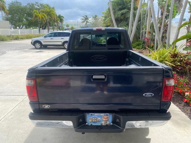 2003 Deep Wedgewood Blue Metallic /Dark Graphite Ford Ranger XLT AUTO X CAB LOW MILES 76,750 (1FTYR44V53P) with an 3.0L SEFI Flex-Fuel FFV V6 Engine engine, Automatic transmission, located at 4701 North Dixie Hwy, Pompano Beach, FL, 33064, (954) 422-2889, 26.240938, -80.123474 - OUR WEBPAGE FLORIDACARS1.COM HAS OVER 100 PHOTOS AND FREE CARFAX LINK 2003 Ford Ranger XLT AUTO AC LOADED GOOD FOR POOL SERVICE OR DELIEVERY SERVICE VERY DEPENDABLE 4 Door Extended Cab Pickup 3.0L V6 F Flex Fuel 23 MPG Rear Wheel Drive Features ABS Brakes Air Conditioning AM/FM Stereo Automatic Tran - Photo#92