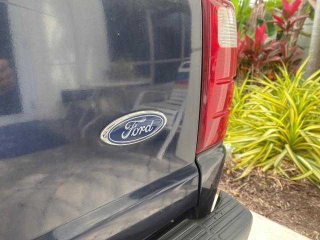 2003 Deep Wedgewood Blue Metallic /Dark Graphite Ford Ranger XLT AUTO X CAB LOW MILES 76,750 (1FTYR44V53P) with an 3.0L SEFI Flex-Fuel FFV V6 Engine engine, Automatic transmission, located at 4701 North Dixie Hwy, Pompano Beach, FL, 33064, (954) 422-2889, 26.240938, -80.123474 - OUR WEBPAGE FLORIDACARS1.COM HAS OVER 100 PHOTOS AND FREE CARFAX LINK 2003 Ford Ranger XLT AUTO AC LOADED GOOD FOR POOL SERVICE OR DELIEVERY SERVICE VERY DEPENDABLE 4 Door Extended Cab Pickup 3.0L V6 F Flex Fuel 23 MPG Rear Wheel Drive Features ABS Brakes Air Conditioning AM/FM Stereo Automatic Tran - Photo#95