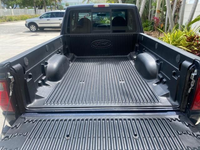 2003 Deep Wedgewood Blue Metallic /Dark Graphite Ford Ranger XLT AUTO X CAB LOW MILES 76,750 (1FTYR44V53P) with an 3.0L SEFI Flex-Fuel FFV V6 Engine engine, Automatic transmission, located at 4701 North Dixie Hwy, Pompano Beach, FL, 33064, (954) 422-2889, 26.240938, -80.123474 - OUR WEBPAGE FLORIDACARS1.COM HAS OVER 100 PHOTOS AND FREE CARFAX LINK 2003 Ford Ranger XLT AUTO AC LOADED GOOD FOR POOL SERVICE OR DELIEVERY SERVICE VERY DEPENDABLE 4 Door Extended Cab Pickup 3.0L V6 F Flex Fuel 23 MPG Rear Wheel Drive Features ABS Brakes Air Conditioning AM/FM Stereo Automatic Tran - Photo#98