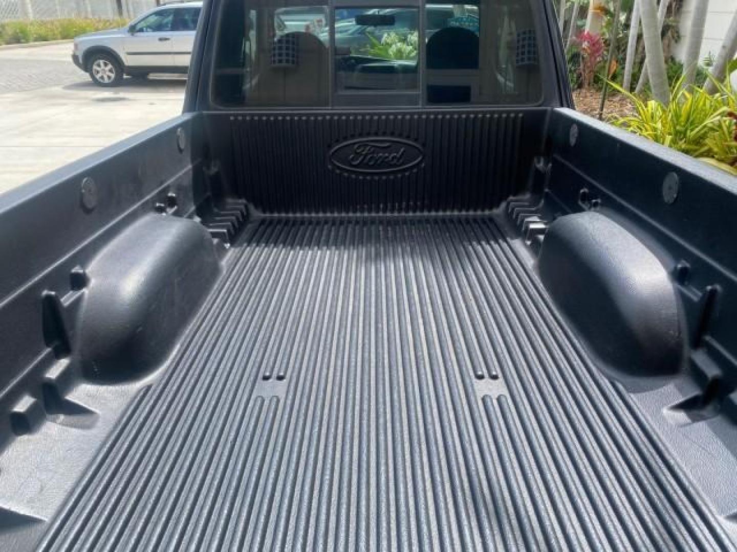 2003 Deep Wedgewood Blue Metallic /Dark Graphite Ford Ranger XLT AUTO X CAB LOW MILES 76,750 (1FTYR44V53P) with an 3.0L SEFI Flex-Fuel FFV V6 Engine engine, Automatic transmission, located at 4701 North Dixie Hwy, Pompano Beach, FL, 33064, (954) 422-2889, 26.240938, -80.123474 - OUR WEBPAGE FLORIDACARS1.COM HAS OVER 100 PHOTOS AND FREE CARFAX LINK 2003 Ford Ranger XLT AUTO AC LOADED GOOD FOR POOL SERVICE OR DELIEVERY SERVICE VERY DEPENDABLE 4 Door Extended Cab Pickup 3.0L V6 F Flex Fuel 23 MPG Rear Wheel Drive Features ABS Brakes Air Conditioning AM/FM Stereo Automatic Tran- Photo#99