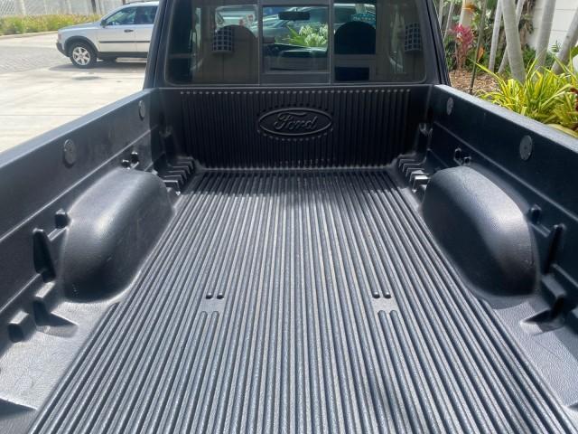2003 Deep Wedgewood Blue Metallic /Dark Graphite Ford Ranger XLT AUTO X CAB LOW MILES 76,750 (1FTYR44V53P) with an 3.0L SEFI Flex-Fuel FFV V6 Engine engine, Automatic transmission, located at 4701 North Dixie Hwy, Pompano Beach, FL, 33064, (954) 422-2889, 26.240938, -80.123474 - OUR WEBPAGE FLORIDACARS1.COM HAS OVER 100 PHOTOS AND FREE CARFAX LINK 2003 Ford Ranger XLT AUTO AC LOADED GOOD FOR POOL SERVICE OR DELIEVERY SERVICE VERY DEPENDABLE 4 Door Extended Cab Pickup 3.0L V6 F Flex Fuel 23 MPG Rear Wheel Drive Features ABS Brakes Air Conditioning AM/FM Stereo Automatic Tran - Photo#99