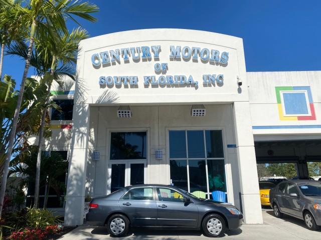 2004 Graphite Pearl /Gray Honda Accord Sdn LX LOW MILES 68,079 (1HGCM56344A) with an 2.4L DOHC MPFI 16-Valve i-VTEC I4 Engine engine, Automatic transmission, located at 4701 North Dixie Hwy, Pompano Beach, FL, 33064, (954) 422-2889, 26.240938, -80.123474 - OUR WEBPAGE FLORIDACARS1.COM HAS OVER 100 PHOTOS AND FREE CARFAX LINK 2004 Honda Accord LX Sedan 4 DR 2.4L I4 F DOHC Gasoline 34 MPG Front Wheel Drive Features ABS Brakes Air Conditioning AM/FM Stereo Automatic Transmission Cassette Player CD Audio Cloth Seats Cruise Control Power Locks Power Mirror - Photo#0