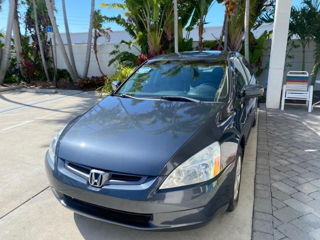 2004 Graphite Pearl /Gray Honda Accord Sdn LX LOW MILES 68,079 (1HGCM56344A) with an 2.4L DOHC MPFI 16-Valve i-VTEC I4 Engine engine, Automatic transmission, located at 4701 North Dixie Hwy, Pompano Beach, FL, 33064, (954) 422-2889, 26.240938, -80.123474 - OUR WEBPAGE FLORIDACARS1.COM HAS OVER 100 PHOTOS AND FREE CARFAX LINK 2004 Honda Accord LX Sedan 4 DR 2.4L I4 F DOHC Gasoline 34 MPG Front Wheel Drive Features ABS Brakes Air Conditioning AM/FM Stereo Automatic Transmission Cassette Player CD Audio Cloth Seats Cruise Control Power Locks Power Mirror - Photo#3