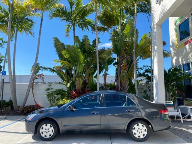 2004 Graphite Pearl /Gray Honda Accord Sdn LX LOW MILES 68,079 (1HGCM56344A) with an 2.4L DOHC MPFI 16-Valve i-VTEC I4 Engine engine, Automatic transmission, located at 4701 North Dixie Hwy, Pompano Beach, FL, 33064, (954) 422-2889, 26.240938, -80.123474 - OUR WEBPAGE FLORIDACARS1.COM HAS OVER 100 PHOTOS AND FREE CARFAX LINK 2004 Honda Accord LX Sedan 4 DR 2.4L I4 F DOHC Gasoline 34 MPG Front Wheel Drive Features ABS Brakes Air Conditioning AM/FM Stereo Automatic Transmission Cassette Player CD Audio Cloth Seats Cruise Control Power Locks Power Mirror - Photo#4