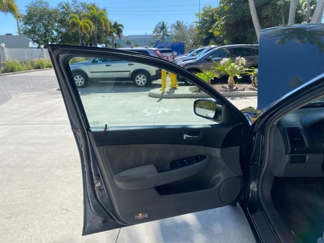 2004 Graphite Pearl /Gray Honda Accord Sdn LX LOW MILES 68,079 (1HGCM56344A) with an 2.4L DOHC MPFI 16-Valve i-VTEC I4 Engine engine, Automatic transmission, located at 4701 North Dixie Hwy, Pompano Beach, FL, 33064, (954) 422-2889, 26.240938, -80.123474 - OUR WEBPAGE FLORIDACARS1.COM HAS OVER 100 PHOTOS AND FREE CARFAX LINK 2004 Honda Accord LX Sedan 4 DR 2.4L I4 F DOHC Gasoline 34 MPG Front Wheel Drive Features ABS Brakes Air Conditioning AM/FM Stereo Automatic Transmission Cassette Player CD Audio Cloth Seats Cruise Control Power Locks Power Mirror - Photo#9