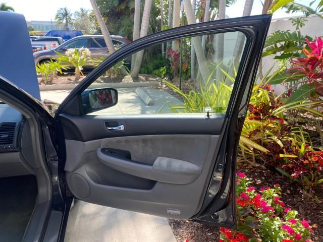 2004 Graphite Pearl /Gray Honda Accord Sdn LX LOW MILES 68,079 (1HGCM56344A) with an 2.4L DOHC MPFI 16-Valve i-VTEC I4 Engine engine, Automatic transmission, located at 4701 North Dixie Hwy, Pompano Beach, FL, 33064, (954) 422-2889, 26.240938, -80.123474 - OUR WEBPAGE FLORIDACARS1.COM HAS OVER 100 PHOTOS AND FREE CARFAX LINK 2004 Honda Accord LX Sedan 4 DR 2.4L I4 F DOHC Gasoline 34 MPG Front Wheel Drive Features ABS Brakes Air Conditioning AM/FM Stereo Automatic Transmission Cassette Player CD Audio Cloth Seats Cruise Control Power Locks Power Mirror - Photo#11