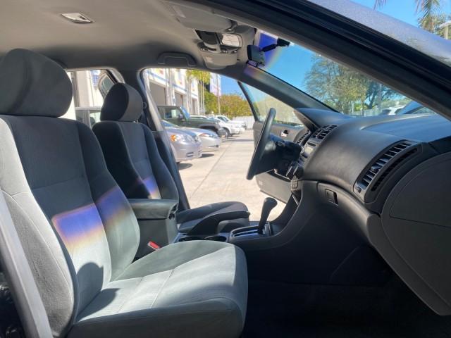 2004 Graphite Pearl /Gray Honda Accord Sdn LX LOW MILES 68,079 (1HGCM56344A) with an 2.4L DOHC MPFI 16-Valve i-VTEC I4 Engine engine, Automatic transmission, located at 4701 North Dixie Hwy, Pompano Beach, FL, 33064, (954) 422-2889, 26.240938, -80.123474 - OUR WEBPAGE FLORIDACARS1.COM HAS OVER 100 PHOTOS AND FREE CARFAX LINK 2004 Honda Accord LX Sedan 4 DR 2.4L I4 F DOHC Gasoline 34 MPG Front Wheel Drive Features ABS Brakes Air Conditioning AM/FM Stereo Automatic Transmission Cassette Player CD Audio Cloth Seats Cruise Control Power Locks Power Mirror - Photo#12