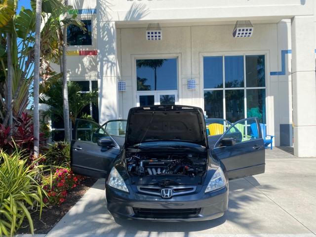 2004 Graphite Pearl /Gray Honda Accord Sdn LX LOW MILES 68,079 (1HGCM56344A) with an 2.4L DOHC MPFI 16-Valve i-VTEC I4 Engine engine, Automatic transmission, located at 4701 North Dixie Hwy, Pompano Beach, FL, 33064, (954) 422-2889, 26.240938, -80.123474 - OUR WEBPAGE FLORIDACARS1.COM HAS OVER 100 PHOTOS AND FREE CARFAX LINK 2004 Honda Accord LX Sedan 4 DR 2.4L I4 F DOHC Gasoline 34 MPG Front Wheel Drive Features ABS Brakes Air Conditioning AM/FM Stereo Automatic Transmission Cassette Player CD Audio Cloth Seats Cruise Control Power Locks Power Mirror - Photo#16