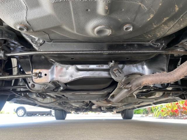 2004 Graphite Pearl /Gray Honda Accord Sdn LX LOW MILES 68,079 (1HGCM56344A) with an 2.4L DOHC MPFI 16-Valve i-VTEC I4 Engine engine, Automatic transmission, located at 4701 North Dixie Hwy, Pompano Beach, FL, 33064, (954) 422-2889, 26.240938, -80.123474 - OUR WEBPAGE FLORIDACARS1.COM HAS OVER 100 PHOTOS AND FREE CARFAX LINK 2004 Honda Accord LX Sedan 4 DR 2.4L I4 F DOHC Gasoline 34 MPG Front Wheel Drive Features ABS Brakes Air Conditioning AM/FM Stereo Automatic Transmission Cassette Player CD Audio Cloth Seats Cruise Control Power Locks Power Mirror - Photo#22