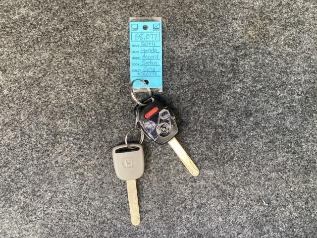 2004 Graphite Pearl /Gray Honda Accord Sdn LX LOW MILES 68,079 (1HGCM56344A) with an 2.4L DOHC MPFI 16-Valve i-VTEC I4 Engine engine, Automatic transmission, located at 4701 North Dixie Hwy, Pompano Beach, FL, 33064, (954) 422-2889, 26.240938, -80.123474 - OUR WEBPAGE FLORIDACARS1.COM HAS OVER 100 PHOTOS AND FREE CARFAX LINK 2004 Honda Accord LX Sedan 4 DR 2.4L I4 F DOHC Gasoline 34 MPG Front Wheel Drive Features ABS Brakes Air Conditioning AM/FM Stereo Automatic Transmission Cassette Player CD Audio Cloth Seats Cruise Control Power Locks Power Mirror - Photo#23