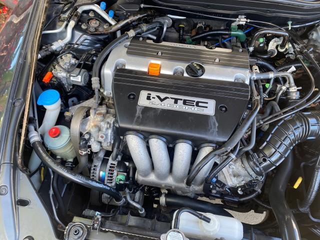 2004 Graphite Pearl /Gray Honda Accord Sdn LX LOW MILES 68,079 (1HGCM56344A) with an 2.4L DOHC MPFI 16-Valve i-VTEC I4 Engine engine, Automatic transmission, located at 4701 North Dixie Hwy, Pompano Beach, FL, 33064, (954) 422-2889, 26.240938, -80.123474 - OUR WEBPAGE FLORIDACARS1.COM HAS OVER 100 PHOTOS AND FREE CARFAX LINK 2004 Honda Accord LX Sedan 4 DR 2.4L I4 F DOHC Gasoline 34 MPG Front Wheel Drive Features ABS Brakes Air Conditioning AM/FM Stereo Automatic Transmission Cassette Player CD Audio Cloth Seats Cruise Control Power Locks Power Mirror - Photo#24