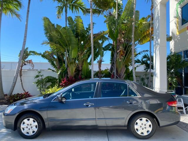 2004 Graphite Pearl /Gray Honda Accord Sdn LX LOW MILES 68,079 (1HGCM56344A) with an 2.4L DOHC MPFI 16-Valve i-VTEC I4 Engine engine, Automatic transmission, located at 4701 North Dixie Hwy, Pompano Beach, FL, 33064, (954) 422-2889, 26.240938, -80.123474 - OUR WEBPAGE FLORIDACARS1.COM HAS OVER 100 PHOTOS AND FREE CARFAX LINK 2004 Honda Accord LX Sedan 4 DR 2.4L I4 F DOHC Gasoline 34 MPG Front Wheel Drive Features ABS Brakes Air Conditioning AM/FM Stereo Automatic Transmission Cassette Player CD Audio Cloth Seats Cruise Control Power Locks Power Mirror - Photo#31