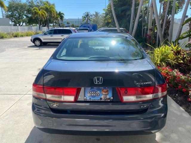 2004 Graphite Pearl /Gray Honda Accord Sdn LX LOW MILES 68,079 (1HGCM56344A) with an 2.4L DOHC MPFI 16-Valve i-VTEC I4 Engine engine, Automatic transmission, located at 4701 North Dixie Hwy, Pompano Beach, FL, 33064, (954) 422-2889, 26.240938, -80.123474 - OUR WEBPAGE FLORIDACARS1.COM HAS OVER 100 PHOTOS AND FREE CARFAX LINK 2004 Honda Accord LX Sedan 4 DR 2.4L I4 F DOHC Gasoline 34 MPG Front Wheel Drive Features ABS Brakes Air Conditioning AM/FM Stereo Automatic Transmission Cassette Player CD Audio Cloth Seats Cruise Control Power Locks Power Mirror - Photo#83