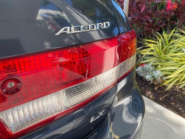 2004 Graphite Pearl /Gray Honda Accord Sdn LX LOW MILES 68,079 (1HGCM56344A) with an 2.4L DOHC MPFI 16-Valve i-VTEC I4 Engine engine, Automatic transmission, located at 4701 North Dixie Hwy, Pompano Beach, FL, 33064, (954) 422-2889, 26.240938, -80.123474 - OUR WEBPAGE FLORIDACARS1.COM HAS OVER 100 PHOTOS AND FREE CARFAX LINK 2004 Honda Accord LX Sedan 4 DR 2.4L I4 F DOHC Gasoline 34 MPG Front Wheel Drive Features ABS Brakes Air Conditioning AM/FM Stereo Automatic Transmission Cassette Player CD Audio Cloth Seats Cruise Control Power Locks Power Mirror - Photo#86