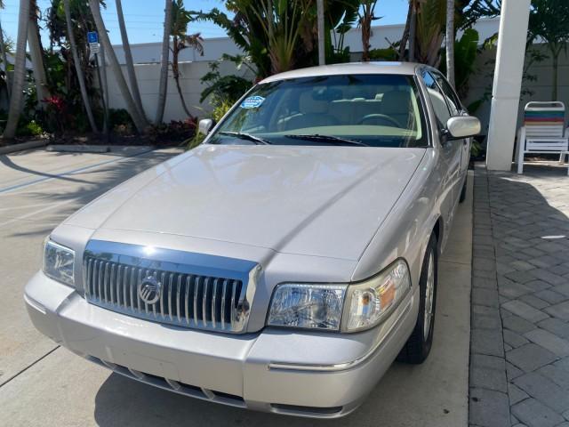2009 Silver Birch Metallic /Light camel Mercury Grand Marquis LS LOW MILES 54,807 (2MEHM75V99X) with an 4.6L OHC SEFI FFV V8 Engine engine, Automatic transmission, located at 4701 North Dixie Hwy, Pompano Beach, FL, 33064, (954) 422-2889, 26.240938, -80.123474 - OUR WEBPAGE FLORIDACARS1.COM HAS OVER 100 PHOTOS AND FREE CARFAX LINK 2009 Mercury Grand Marquis LS Sedan 4 DR 4.6L V8 F SOHC 16V Flex Fuel 25 MPG Rear Wheel Drive Features ABS Brakes Air Conditioning Alloy Wheels AM/FM Stereo Automatic Transmission CD Audio Cruise Control Flex Fuel Vehicle Leather - Photo#3