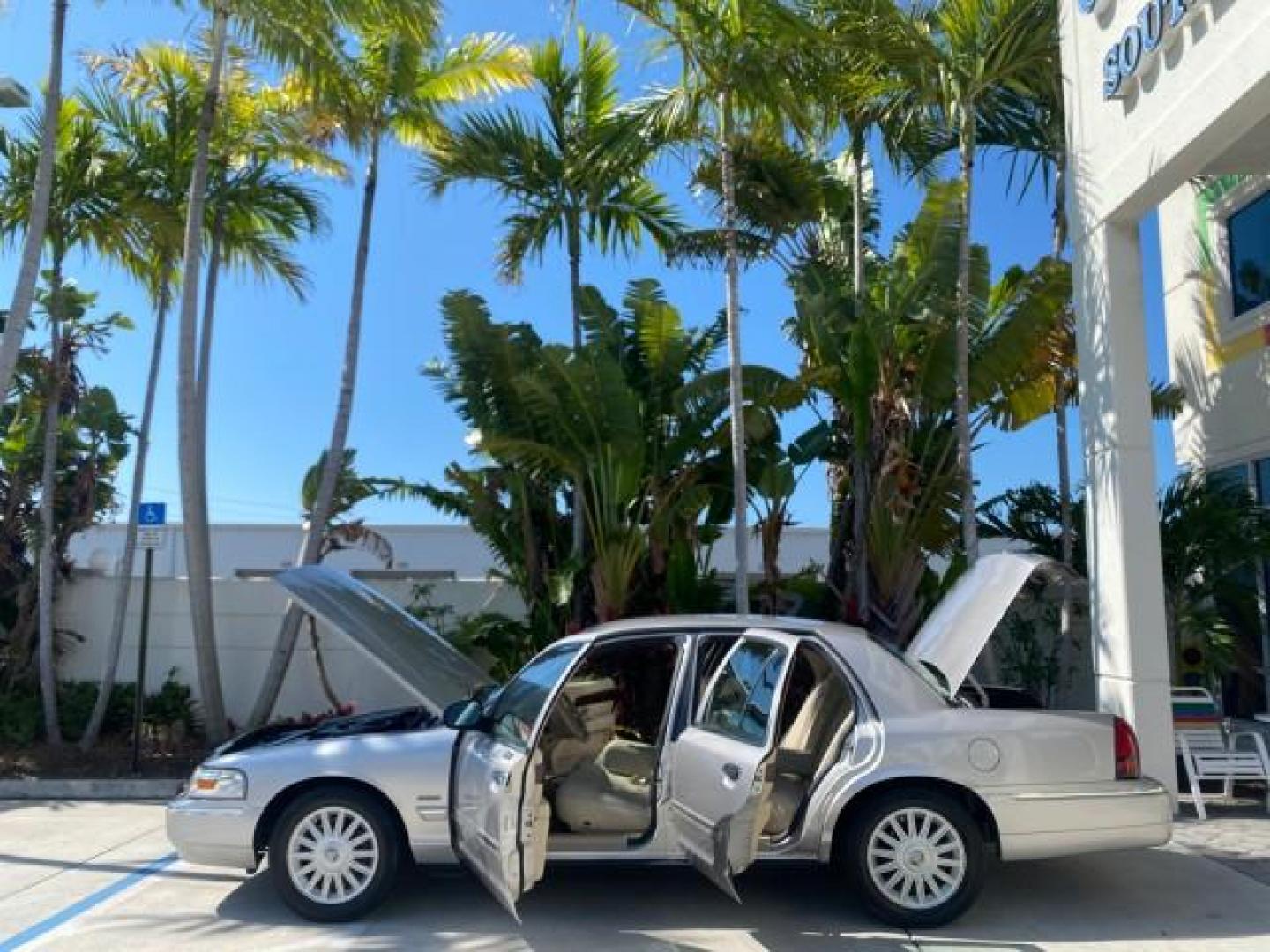 2009 Silver Birch Metallic /Light camel Mercury Grand Marquis LS LOW MILES 54,807 (2MEHM75V99X) with an 4.6L OHC SEFI FFV V8 Engine engine, Automatic transmission, located at 4701 North Dixie Hwy, Pompano Beach, FL, 33064, (954) 422-2889, 26.240938, -80.123474 - OUR WEBPAGE FLORIDACARS1.COM HAS OVER 100 PHOTOS AND FREE CARFAX LINK 2009 Mercury Grand Marquis LS Sedan 4 DR 4.6L V8 F SOHC 16V Flex Fuel 25 MPG Rear Wheel Drive Features ABS Brakes Air Conditioning Alloy Wheels AM/FM Stereo Automatic Transmission CD Audio Cruise Control Flex Fuel Vehicle Leather- Photo#8