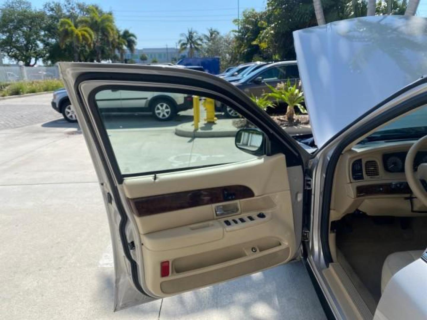 2009 Silver Birch Metallic /Light camel Mercury Grand Marquis LS LOW MILES 54,807 (2MEHM75V99X) with an 4.6L OHC SEFI FFV V8 Engine engine, Automatic transmission, located at 4701 North Dixie Hwy, Pompano Beach, FL, 33064, (954) 422-2889, 26.240938, -80.123474 - OUR WEBPAGE FLORIDACARS1.COM HAS OVER 100 PHOTOS AND FREE CARFAX LINK 2009 Mercury Grand Marquis LS Sedan 4 DR 4.6L V8 F SOHC 16V Flex Fuel 25 MPG Rear Wheel Drive Features ABS Brakes Air Conditioning Alloy Wheels AM/FM Stereo Automatic Transmission CD Audio Cruise Control Flex Fuel Vehicle Leather- Photo#9