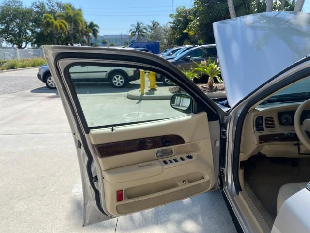 2009 Silver Birch Metallic /Light camel Mercury Grand Marquis LS LOW MILES 54,807 (2MEHM75V99X) with an 4.6L OHC SEFI FFV V8 Engine engine, Automatic transmission, located at 4701 North Dixie Hwy, Pompano Beach, FL, 33064, (954) 422-2889, 26.240938, -80.123474 - OUR WEBPAGE FLORIDACARS1.COM HAS OVER 100 PHOTOS AND FREE CARFAX LINK 2009 Mercury Grand Marquis LS Sedan 4 DR 4.6L V8 F SOHC 16V Flex Fuel 25 MPG Rear Wheel Drive Features ABS Brakes Air Conditioning Alloy Wheels AM/FM Stereo Automatic Transmission CD Audio Cruise Control Flex Fuel Vehicle Leather - Photo#9