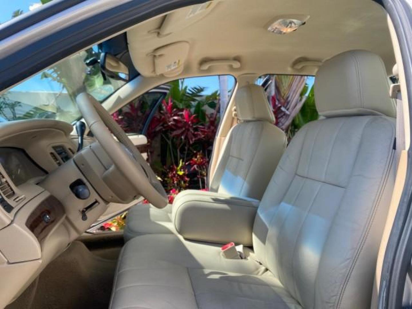 2009 Silver Birch Metallic /Light camel Mercury Grand Marquis LS LOW MILES 54,807 (2MEHM75V99X) with an 4.6L OHC SEFI FFV V8 Engine engine, Automatic transmission, located at 4701 North Dixie Hwy, Pompano Beach, FL, 33064, (954) 422-2889, 26.240938, -80.123474 - OUR WEBPAGE FLORIDACARS1.COM HAS OVER 100 PHOTOS AND FREE CARFAX LINK 2009 Mercury Grand Marquis LS Sedan 4 DR 4.6L V8 F SOHC 16V Flex Fuel 25 MPG Rear Wheel Drive Features ABS Brakes Air Conditioning Alloy Wheels AM/FM Stereo Automatic Transmission CD Audio Cruise Control Flex Fuel Vehicle Leather- Photo#10