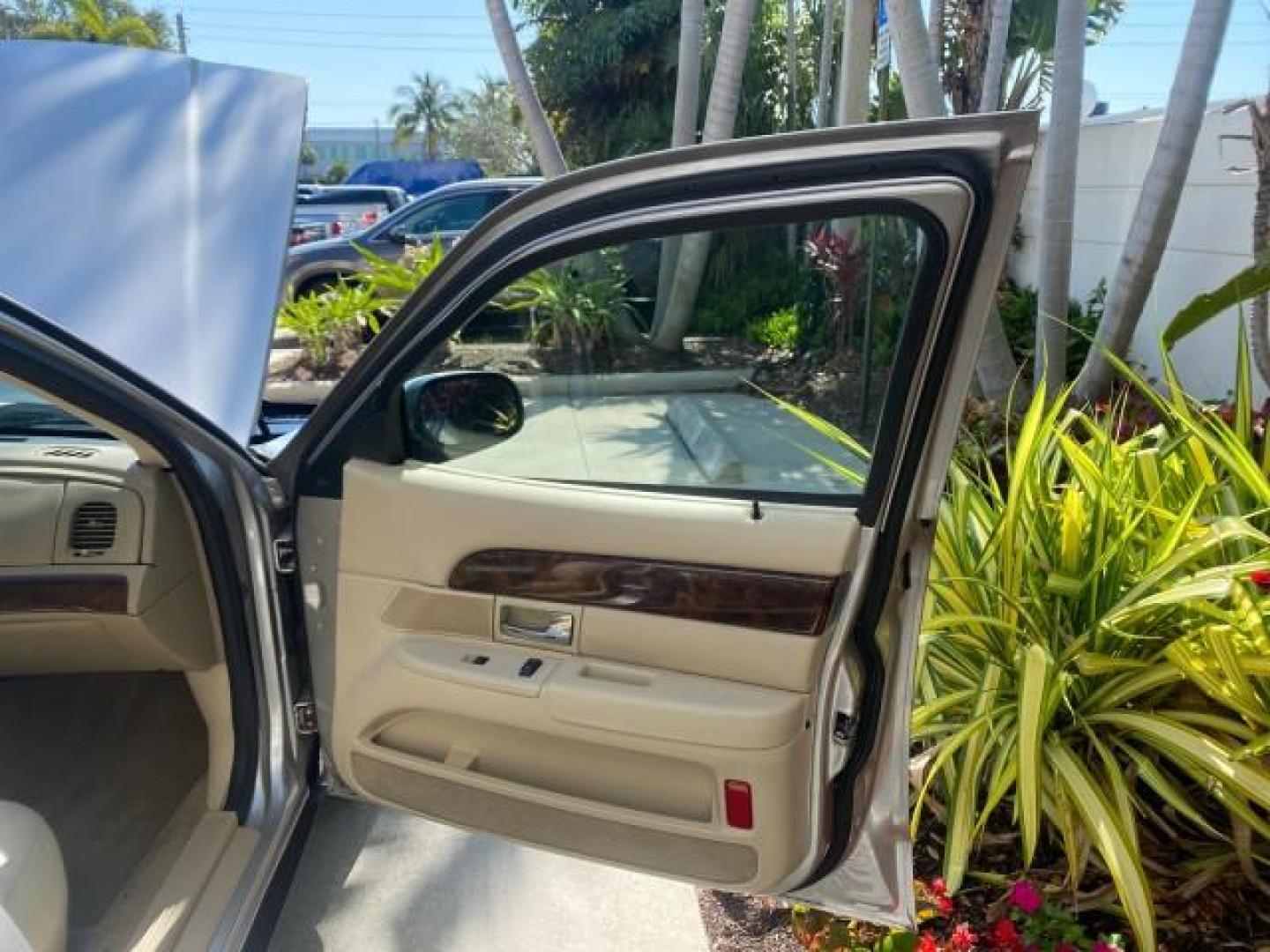 2009 Silver Birch Metallic /Light camel Mercury Grand Marquis LS LOW MILES 54,807 (2MEHM75V99X) with an 4.6L OHC SEFI FFV V8 Engine engine, Automatic transmission, located at 4701 North Dixie Hwy, Pompano Beach, FL, 33064, (954) 422-2889, 26.240938, -80.123474 - OUR WEBPAGE FLORIDACARS1.COM HAS OVER 100 PHOTOS AND FREE CARFAX LINK 2009 Mercury Grand Marquis LS Sedan 4 DR 4.6L V8 F SOHC 16V Flex Fuel 25 MPG Rear Wheel Drive Features ABS Brakes Air Conditioning Alloy Wheels AM/FM Stereo Automatic Transmission CD Audio Cruise Control Flex Fuel Vehicle Leather- Photo#11