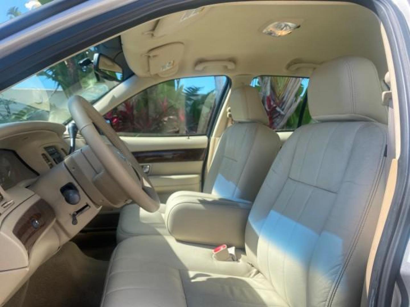2009 Silver Birch Metallic /Light camel Mercury Grand Marquis LS LOW MILES 54,807 (2MEHM75V99X) with an 4.6L OHC SEFI FFV V8 Engine engine, Automatic transmission, located at 4701 North Dixie Hwy, Pompano Beach, FL, 33064, (954) 422-2889, 26.240938, -80.123474 - OUR WEBPAGE FLORIDACARS1.COM HAS OVER 100 PHOTOS AND FREE CARFAX LINK 2009 Mercury Grand Marquis LS Sedan 4 DR 4.6L V8 F SOHC 16V Flex Fuel 25 MPG Rear Wheel Drive Features ABS Brakes Air Conditioning Alloy Wheels AM/FM Stereo Automatic Transmission CD Audio Cruise Control Flex Fuel Vehicle Leather- Photo#41