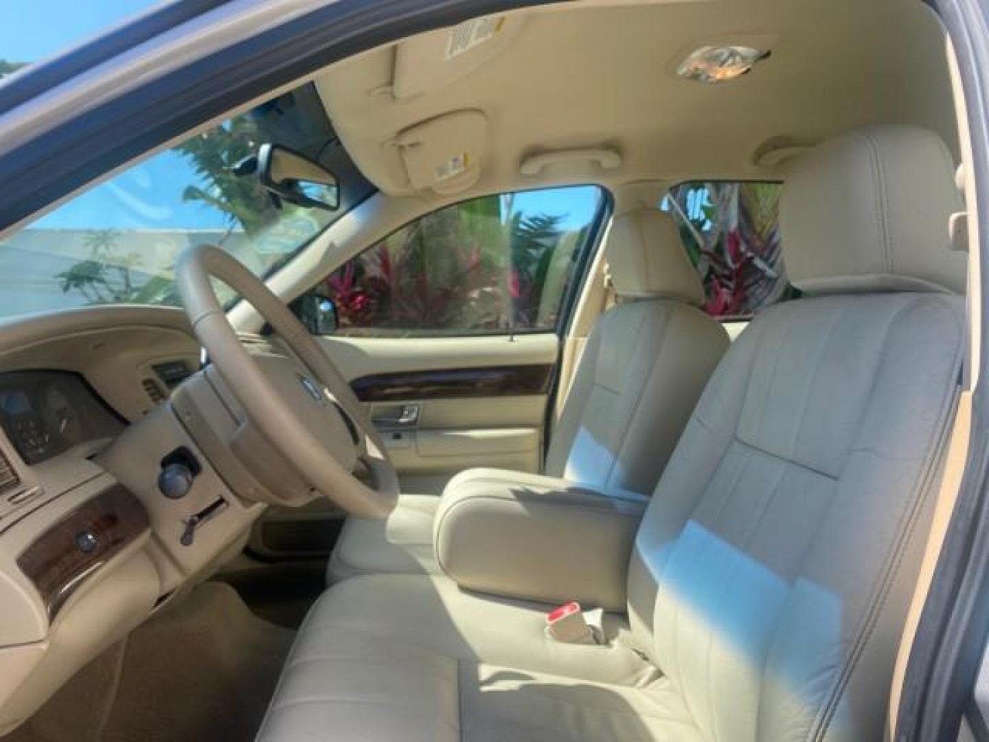 2009 Silver Birch Metallic /Light camel Mercury Grand Marquis LS LOW MILES 54,807 (2MEHM75V99X) with an 4.6L OHC SEFI FFV V8 Engine engine, Automatic transmission, located at 4701 North Dixie Hwy, Pompano Beach, FL, 33064, (954) 422-2889, 26.240938, -80.123474 - OUR WEBPAGE FLORIDACARS1.COM HAS OVER 100 PHOTOS AND FREE CARFAX LINK 2009 Mercury Grand Marquis LS Sedan 4 DR 4.6L V8 F SOHC 16V Flex Fuel 25 MPG Rear Wheel Drive Features ABS Brakes Air Conditioning Alloy Wheels AM/FM Stereo Automatic Transmission CD Audio Cruise Control Flex Fuel Vehicle Leather- Photo#42