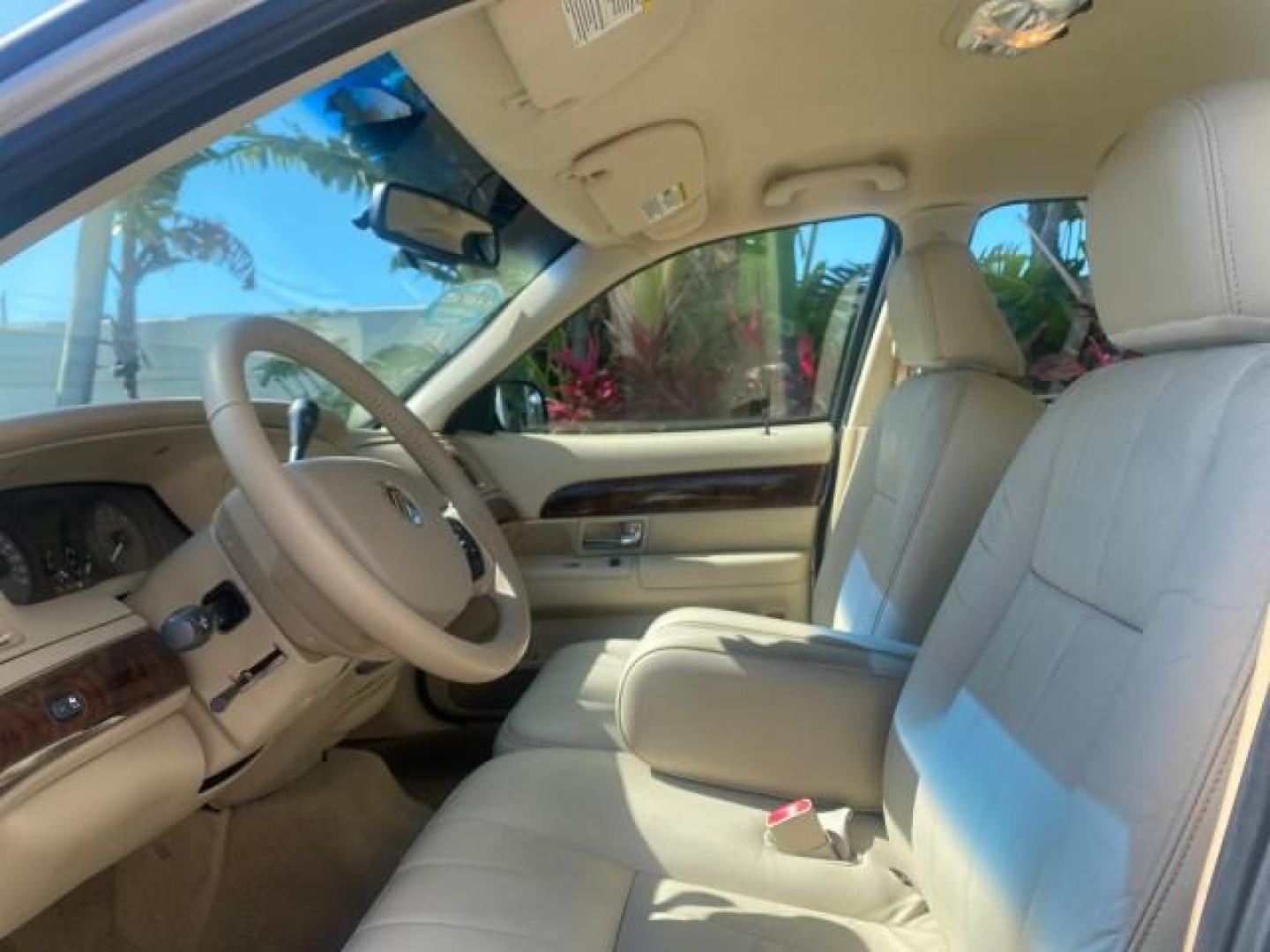 2009 Silver Birch Metallic /Light camel Mercury Grand Marquis LS LOW MILES 54,807 (2MEHM75V99X) with an 4.6L OHC SEFI FFV V8 Engine engine, Automatic transmission, located at 4701 North Dixie Hwy, Pompano Beach, FL, 33064, (954) 422-2889, 26.240938, -80.123474 - OUR WEBPAGE FLORIDACARS1.COM HAS OVER 100 PHOTOS AND FREE CARFAX LINK 2009 Mercury Grand Marquis LS Sedan 4 DR 4.6L V8 F SOHC 16V Flex Fuel 25 MPG Rear Wheel Drive Features ABS Brakes Air Conditioning Alloy Wheels AM/FM Stereo Automatic Transmission CD Audio Cruise Control Flex Fuel Vehicle Leather- Photo#43