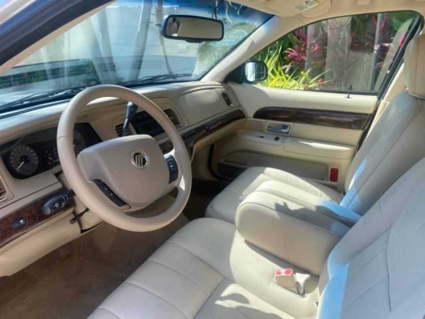 2009 Silver Birch Metallic /Light camel Mercury Grand Marquis LS LOW MILES 54,807 (2MEHM75V99X) with an 4.6L OHC SEFI FFV V8 Engine engine, Automatic transmission, located at 4701 North Dixie Hwy, Pompano Beach, FL, 33064, (954) 422-2889, 26.240938, -80.123474 - OUR WEBPAGE FLORIDACARS1.COM HAS OVER 100 PHOTOS AND FREE CARFAX LINK 2009 Mercury Grand Marquis LS Sedan 4 DR 4.6L V8 F SOHC 16V Flex Fuel 25 MPG Rear Wheel Drive Features ABS Brakes Air Conditioning Alloy Wheels AM/FM Stereo Automatic Transmission CD Audio Cruise Control Flex Fuel Vehicle Leather- Photo#44