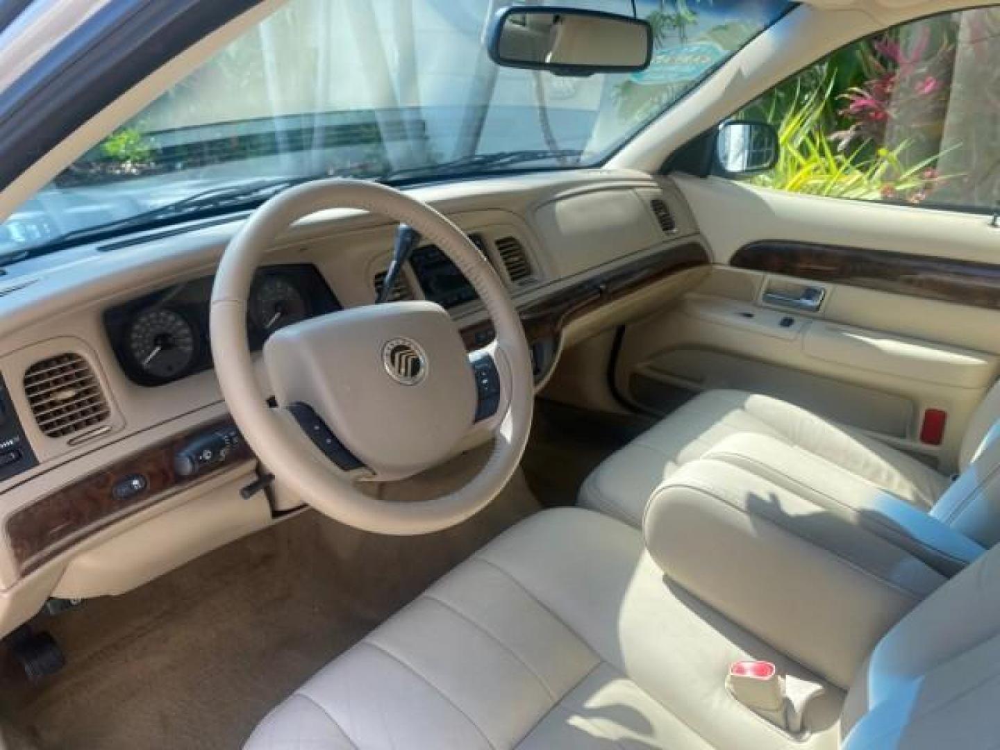 2009 Silver Birch Metallic /Light camel Mercury Grand Marquis LS LOW MILES 54,807 (2MEHM75V99X) with an 4.6L OHC SEFI FFV V8 Engine engine, Automatic transmission, located at 4701 North Dixie Hwy, Pompano Beach, FL, 33064, (954) 422-2889, 26.240938, -80.123474 - OUR WEBPAGE FLORIDACARS1.COM HAS OVER 100 PHOTOS AND FREE CARFAX LINK 2009 Mercury Grand Marquis LS Sedan 4 DR 4.6L V8 F SOHC 16V Flex Fuel 25 MPG Rear Wheel Drive Features ABS Brakes Air Conditioning Alloy Wheels AM/FM Stereo Automatic Transmission CD Audio Cruise Control Flex Fuel Vehicle Leather- Photo#45