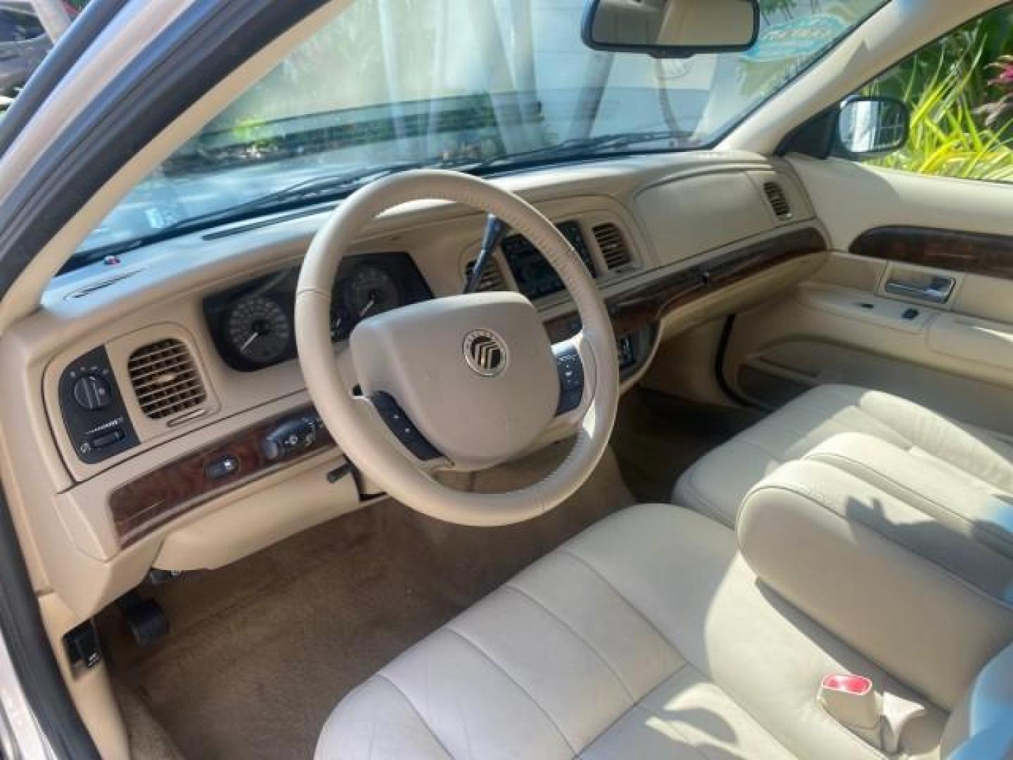2009 Silver Birch Metallic /Light camel Mercury Grand Marquis LS LOW MILES 54,807 (2MEHM75V99X) with an 4.6L OHC SEFI FFV V8 Engine engine, Automatic transmission, located at 4701 North Dixie Hwy, Pompano Beach, FL, 33064, (954) 422-2889, 26.240938, -80.123474 - OUR WEBPAGE FLORIDACARS1.COM HAS OVER 100 PHOTOS AND FREE CARFAX LINK 2009 Mercury Grand Marquis LS Sedan 4 DR 4.6L V8 F SOHC 16V Flex Fuel 25 MPG Rear Wheel Drive Features ABS Brakes Air Conditioning Alloy Wheels AM/FM Stereo Automatic Transmission CD Audio Cruise Control Flex Fuel Vehicle Leather- Photo#46